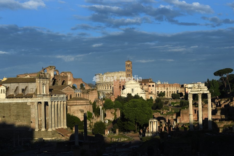 The Roman Forum (Italian: Foro Romano) seen from Capitol Hill. The Forum is a rectangular forum surrounded by the ruins of several important ancient government buildings at the center of the city of Rome. Left: The Temple of Antoninus and Faustina, the basilica of Maxentius and Constantine. Center:…