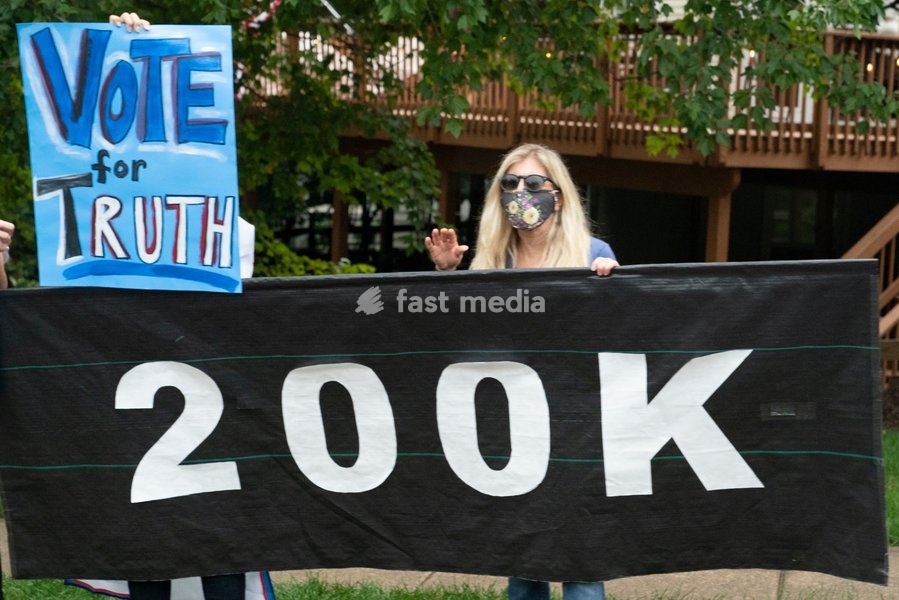 Protesters demonstrate at Trump National Golf Club in Sterling, Virginia on Sunday, September 27, 2020