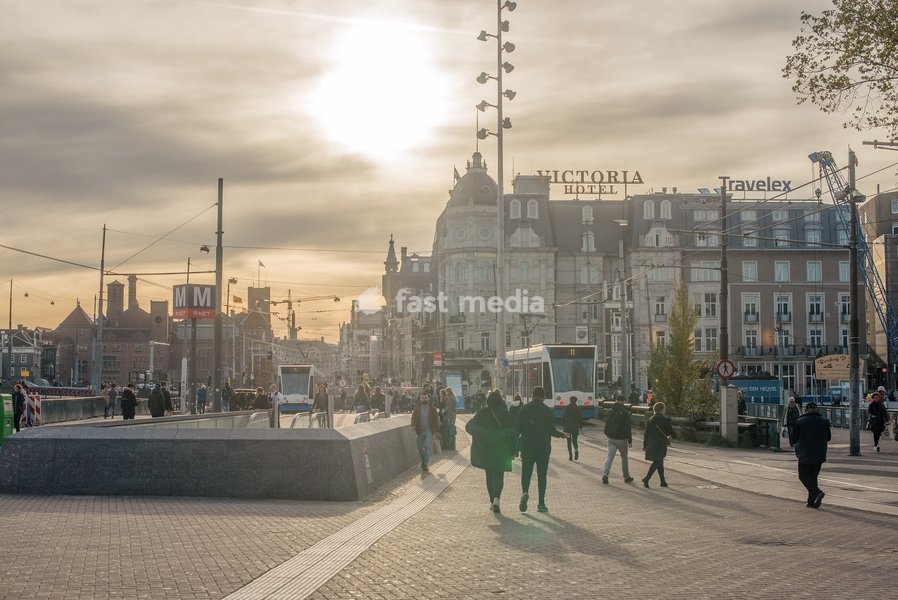 Pedestrians on a square in Amsterdam, The Netherlands