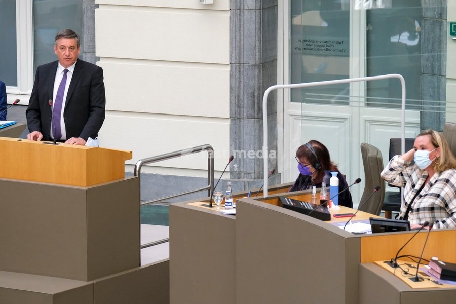 Flemish Minister President Jan Jambon, EU Commissioner for Democracy and Demography Dubravka Suica and Flemish parliament chairwoman Liesbeth Homans pictured during a plenary session of the Flemish Parliament in Brussels, Wednesday 05 May 2021