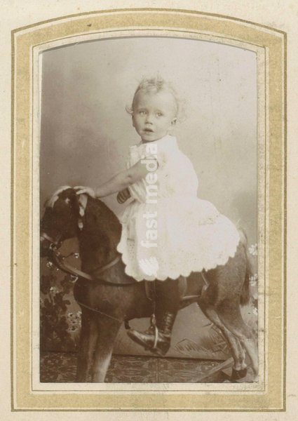 Portrait of a toddler in a dress on a rocking horse. Photo, 1890–1915, Cornelis Johannes Lodewicus Vermeulen. Inv. Nr. RP-F-F00815–39–4 Amsterdam, Rijksmuseum