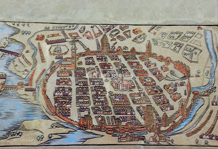 Poland, city of Poznan (former German: Posen): detail (Old Town) of historic city map of Poznan at facade Archeological Museum; the map shows on left side Cathedral Island, the historic nucleus of Poznan, river Warta (German: Warthe), and on the right side the Old Town, built 1253 onwards. The…