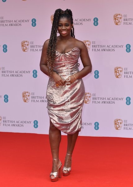 Clara Amfo attends the EE British Academy Film Awards in 2022 at the Royal Albert Hall in London, England. Sunday 13th March 2022