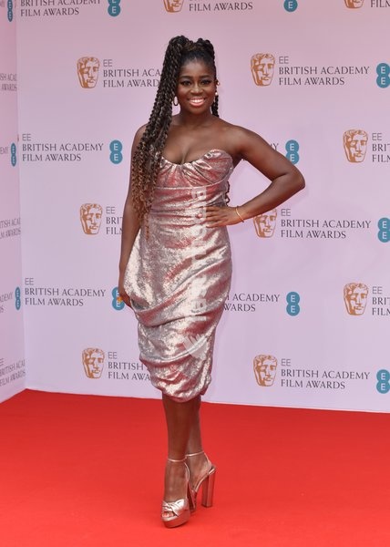 Clara Amfo attends the EE British Academy Film Awards in 2022 at the Royal Albert Hall in London, England. Sunday 13th March 2022