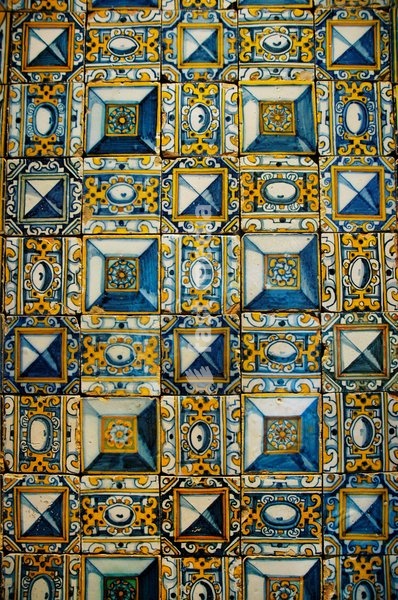 National Tile Museum. Housed in the Madre de Deus Convent, founded in 1509 by Queen Doña Leonor for the Poor Clares of Setúbal. It was enlarged by John III and modified in the 18th century. It is dedicated to the history of Portuguese tiles. Detail of one of the tiled panel with motifs called ponta…