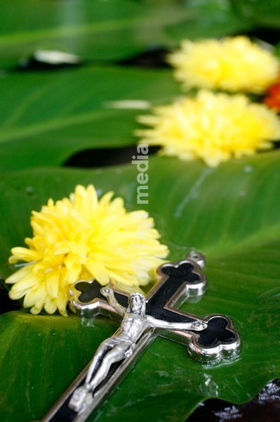 Crucifix and flowers, Kathmandu, Nepal, Asia