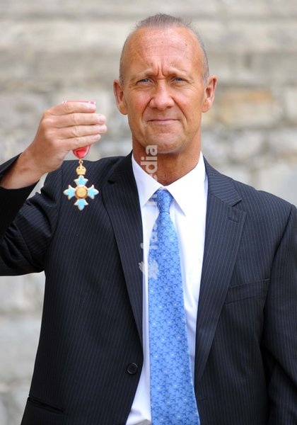 Pic Shows: Brian Fleet, senior Airbus vice-president, at Windsor Castle, where he recieved an OBE for services to the aviation industry