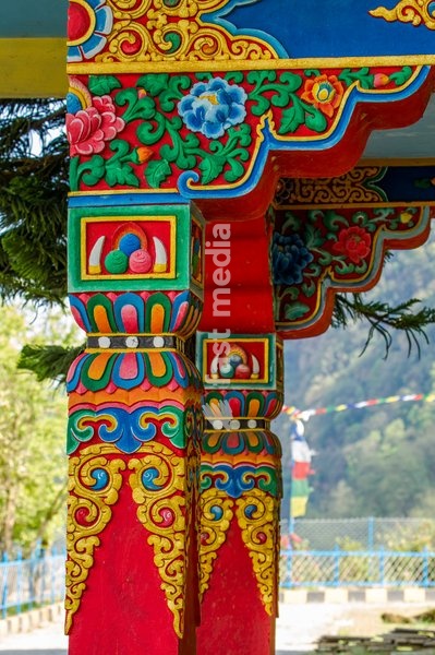 Ornately painted woodwork with religious motifs in the Pema Tsal Sakya Monastery, a Buddhist monastery, Pokhara, Nepal