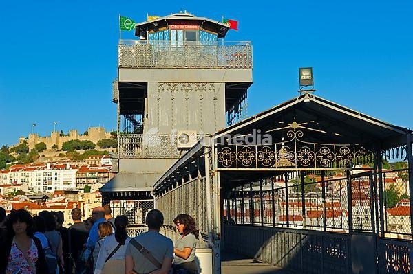 Lisbon, Tourist at Santa Justa elevator and St George's Castle at background, Elevador de Santa Justa, Castelo de Sao Jorge, Portugal