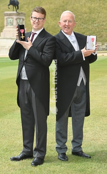 Matthew Hyde and his father Richard Hyde during an Investitures Ceremony at Windsor Castle in Windsor, Berkshire