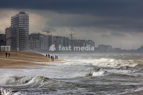 Block of flats and beach during storm at sea, Ostend, Belgium