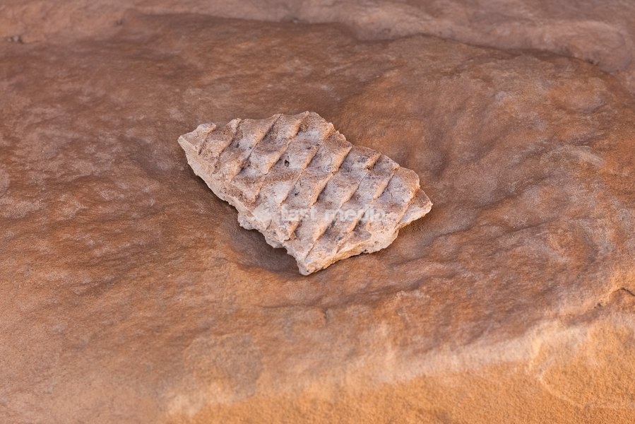 A potsherd of Ancestral Puebloan corrugated pottery found in Chaco Culture National Historical Park in New Mexico. Chaco Culture is a UNESCO World Heritage Site