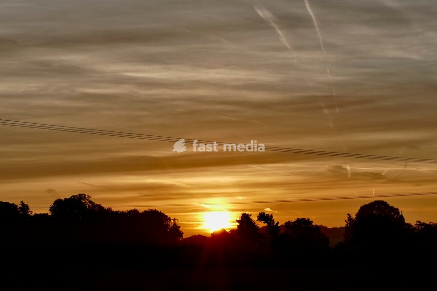 The days sun rises on a chilly morning in the countryside