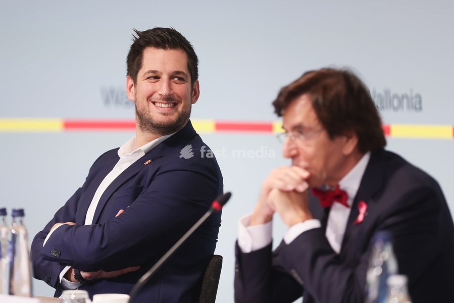 Walloon Minister of Budget and Finances, Airports and Sports Infrastructure Adrien Dolimont and Walloon Minister President Elio Di Rupo pictured during a press conference of the Walloon government regarding their agreement on the budget of 2023, Friday 07 October 2022, in Namur