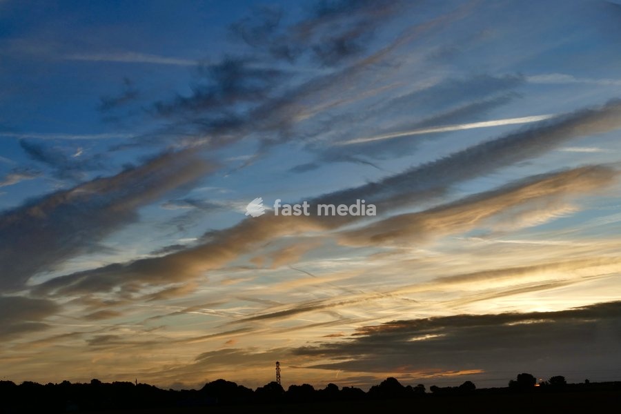 Pretty skies at daybreak as the sun rises over the countryside