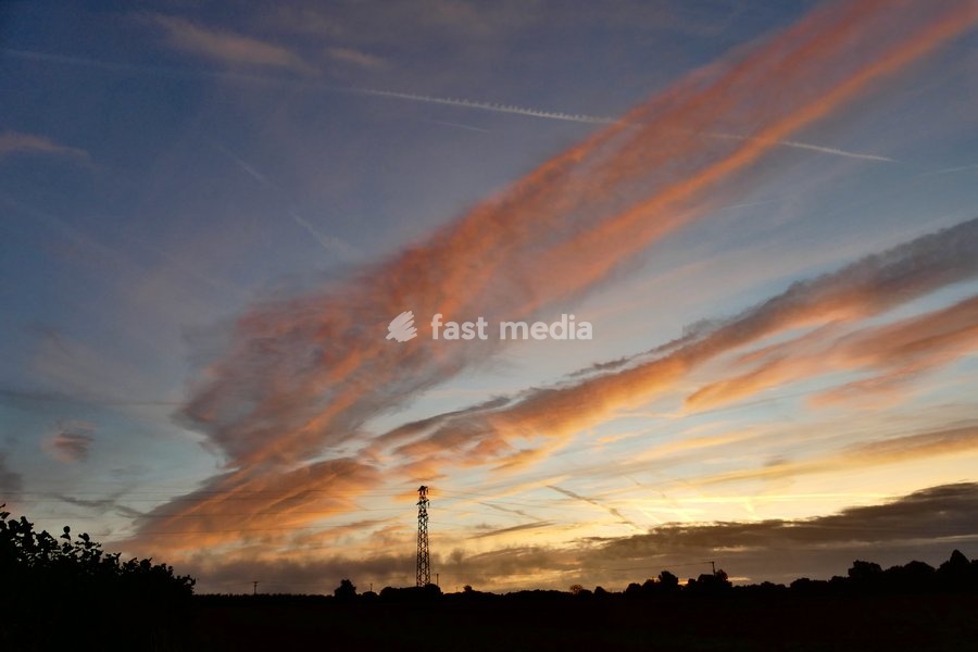 Pretty skies at daybreak as the sun rises over the countryside