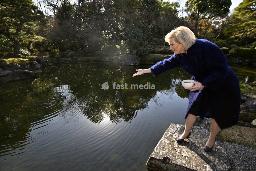 Princess Astrid of Belgium throws food in the water of a pond, after the commemoration of the 100th anniversary of the 1920s Japanese book donation to the University of Louvain - Leuven, during the Belgian Economic Mission to Japan, Friday 09 December 2022 in Kyoto. A delegation featuring the…