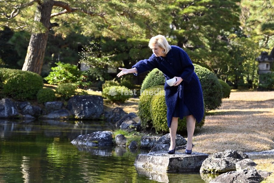 Princess Astrid of Belgium throws food in the water of a pond, after the commemoration of the 100th anniversary of the 1920s Japanese book donation to the University of Louvain - Leuven, during the Belgian Economic Mission to Japan, Friday 09 December 2022 in Kyoto. A delegation featuring the…