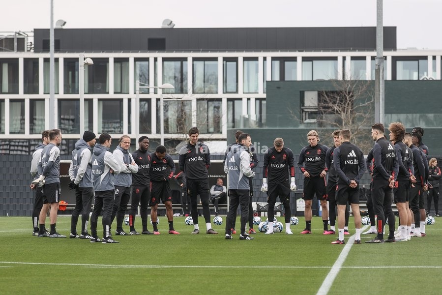 Belgium's head coach Domenico Tedesco talks to his players during a training session of Belgian national soccer team Red Devils, Tuesday 21 March 2023, at the Royal Belgian Football Association RBFA's headquarters in Tubize. The Red Devils are preparing for the upcoming games against Sweden and…