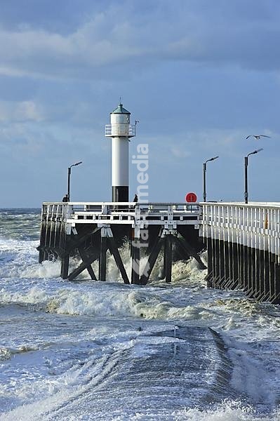 North Sea and wooden pier at stormy weather, Nieuwpoort, Belgium