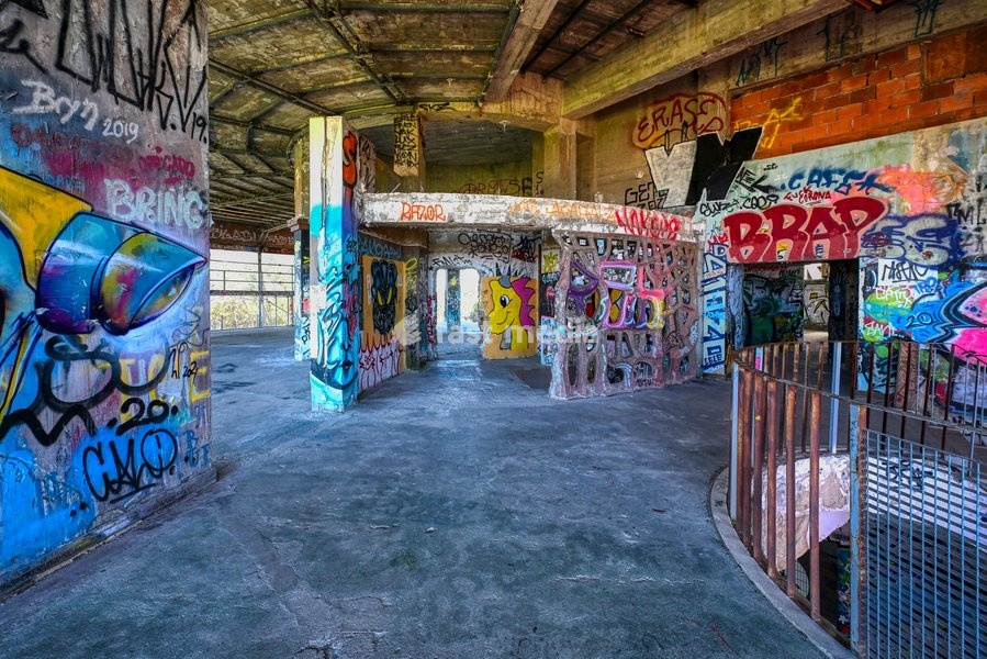 Walls covered with paintings and graffiti, interior of the former Panoramic restaurant, Monsanto, Lisbon, Portugal, Europe