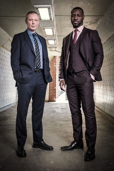 JOHN SIMM and RICHIE CAMPBELL in GRACE, 2021, directed by JOHN ALEXANDER and JULIA FORD. Copyright Second Act Productions
