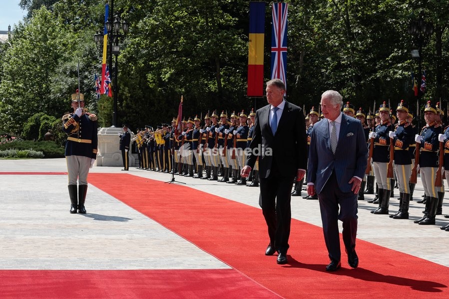 Handout photo issued by Buckingham Palace of President Iohannis and King Charles III receiving the Guard of Honour at Cotroceni Palace during a private visit to Bucharest, Romania. Issue date: Friday June 2, 2023. NOTE TO EDITORS: This handout photo may only be used for editorial reporting purposes…