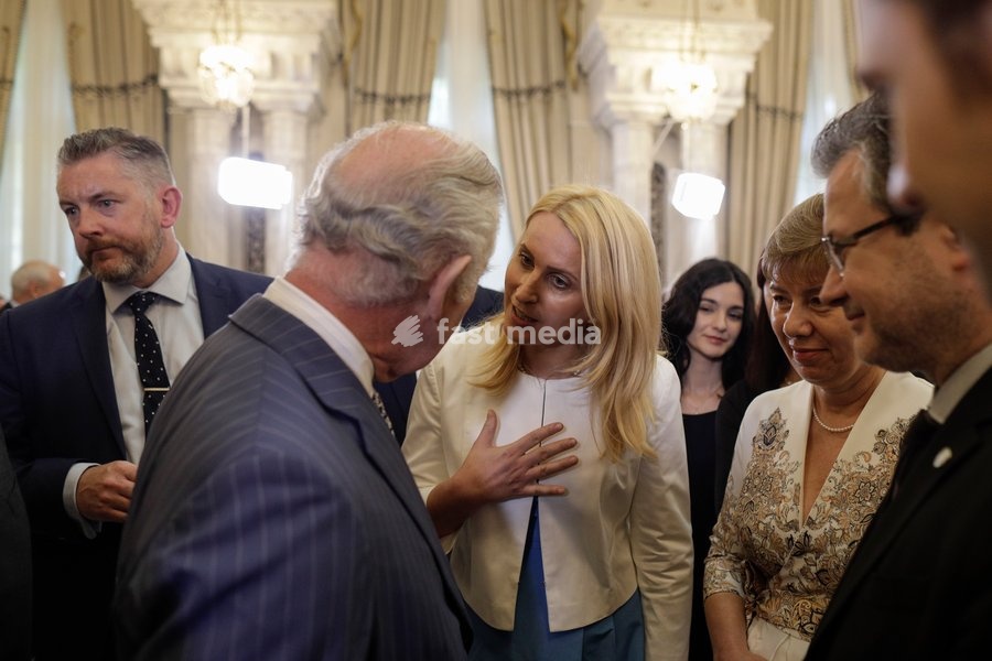 Handout photo issued by Buckingham Palace of King Charles III meeting Beatrice Mahler, manager of the Marius Nasta National Pneumology Institute, during a reception held in his honour, marking 25 years since his first visit to Romania, at Cotroceni Palace during a private visit to Bucharest,…