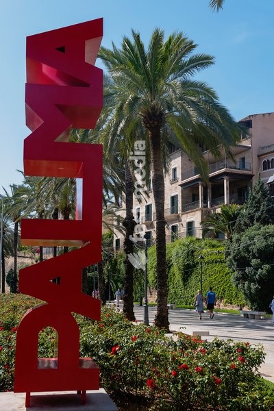 Spain, Balearic Islands, Majorca, Palma de Mallorca. Escultura Palma. Red Palma sign on the Paseo Sagrera or Passeig de Sagrera in Catalan, a quiet promenade on the seafront