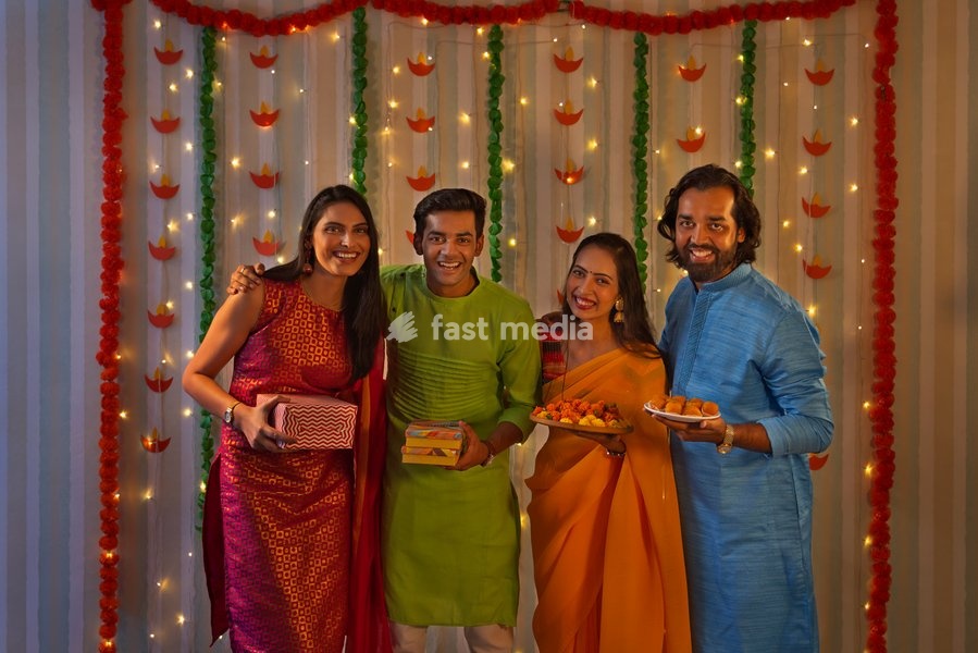 Group of friends celebrating Diwali together at home