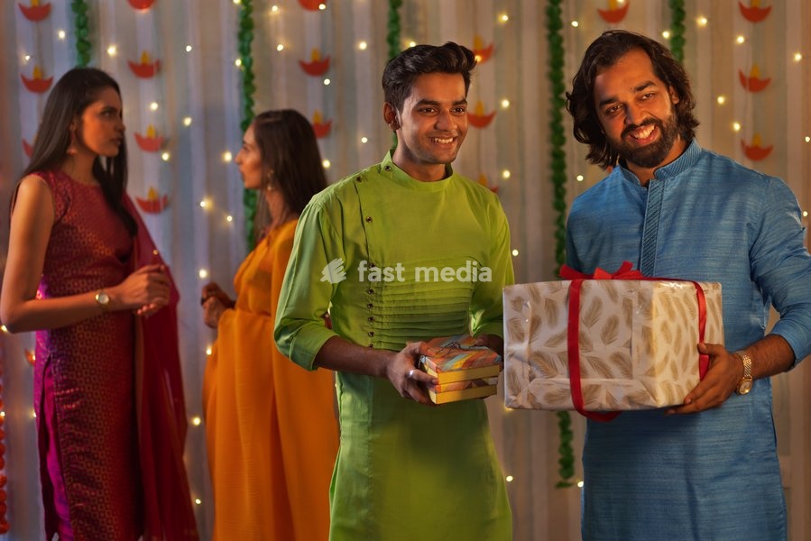 Group of friends celebrating Diwali together at home