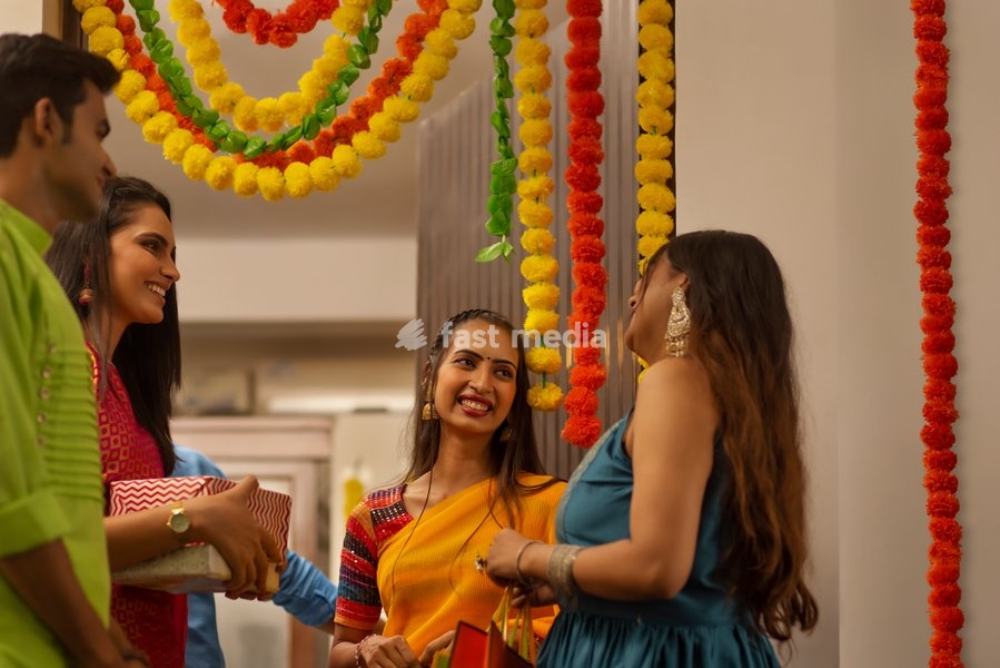Group of friends arriving at house on the occasion of Diwali