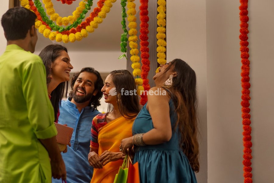 Group of friends arriving at house on the occasion of Diwali