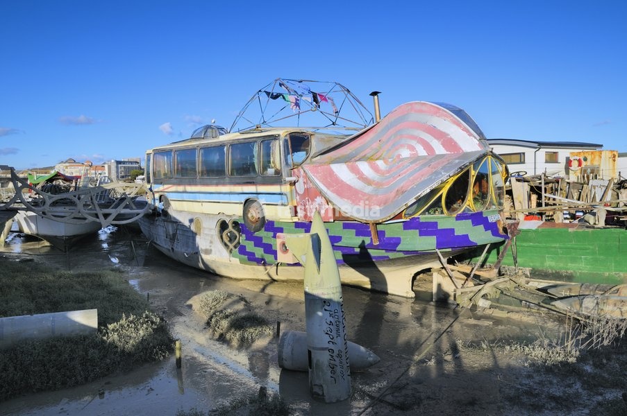 Alternative living on an artistic and unusually constructed houseboat moored on the banks of the river Adur at Shoreham-by-Sea in West Sussex
