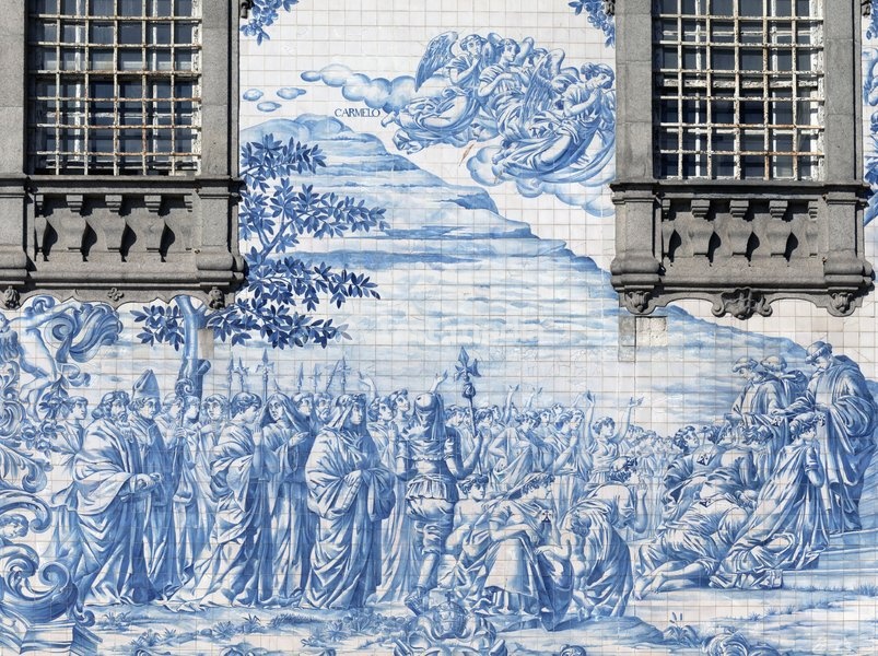 Porto, Portugal. Azulejos decorating the exterior of the Igreja do Carmo. The church was built in the mid-18th century. The tiles, designed by Silvestro Silvestri, were added in 1912. The historic centre of Porto is a UNESCO World Heritage Site