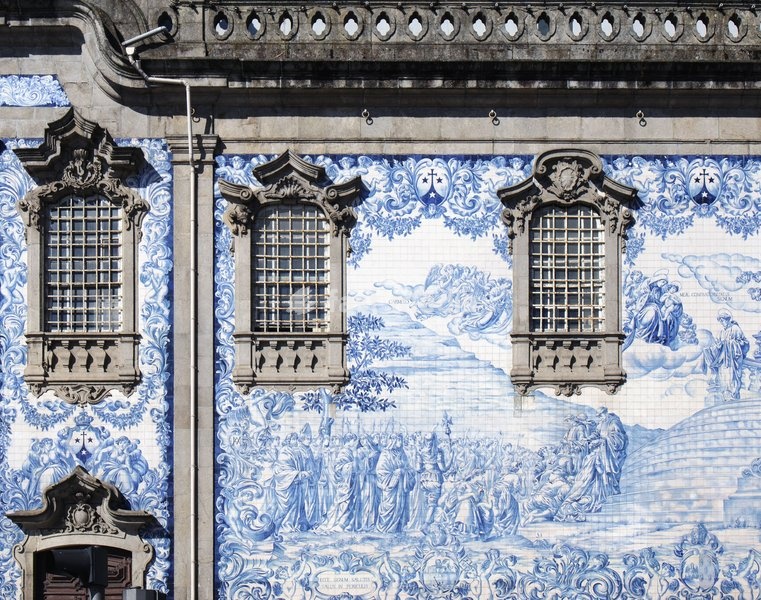 Porto, Portugal. Azulejos decorating the exterior of the Igreja do Carmo. The church was built in the mid-18th century. The tiles, designed by Silvestro Silvestri, were added in 1912. The historic centre of Porto is a UNESCO World Heritage Site