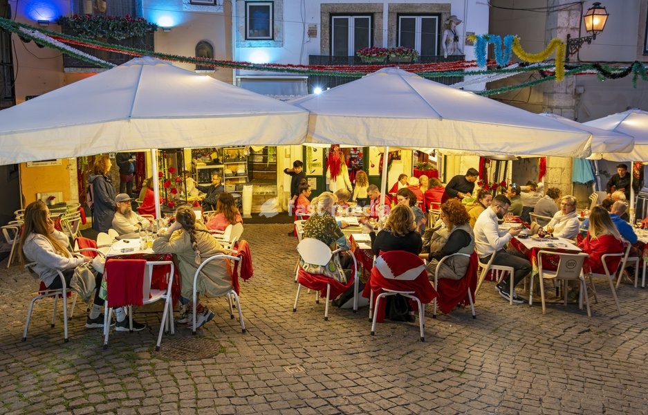 Outdoor restaurant in Alfama by night, Lisbon, Portugal
