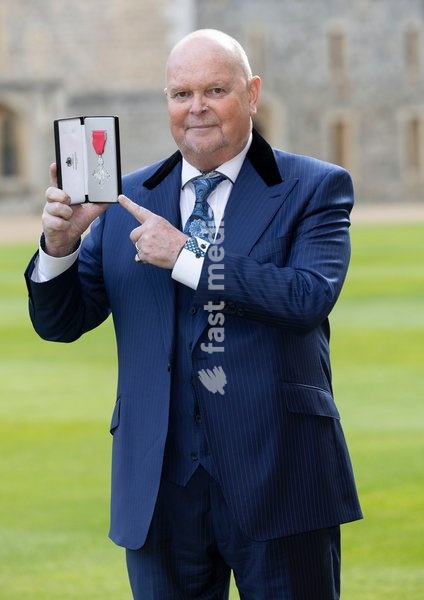 17/04/2024. London, United Kingdom. Broadcaster James Whale with his MBE after an Investiture at Windsor Castle, United Kingdom