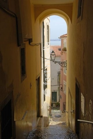 Narrow street, Alfama district, Lisbon, Portugal, Europe