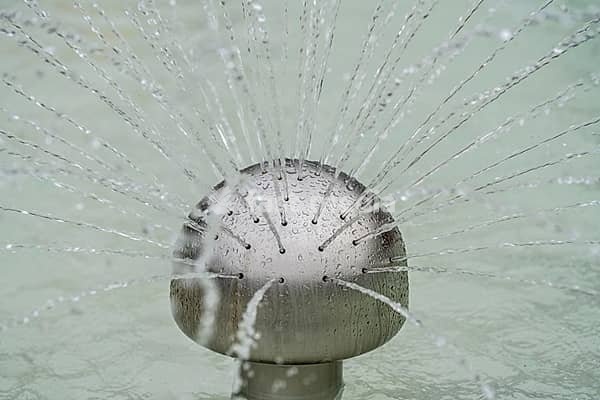 Water feature, fountain, in a children's swimming pool, of an outdoor pool