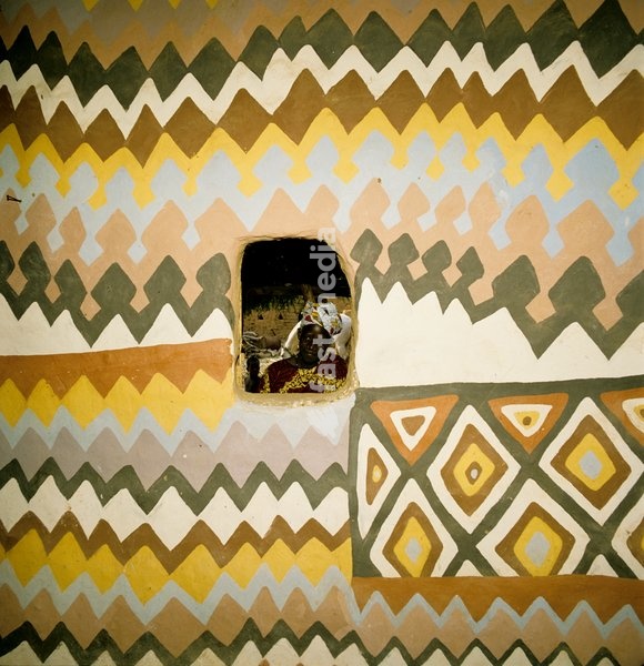 Sokhane Camara proudly looks into her home which was painted by in-laws Bonco and Tare Camara. Buanch, Mauritania