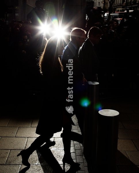 Kate Middleton and Prince William leave New Zealand House after signing in the condolences book for the victims of the Christchurch earthquake, in London, Britain, 25 February 2011