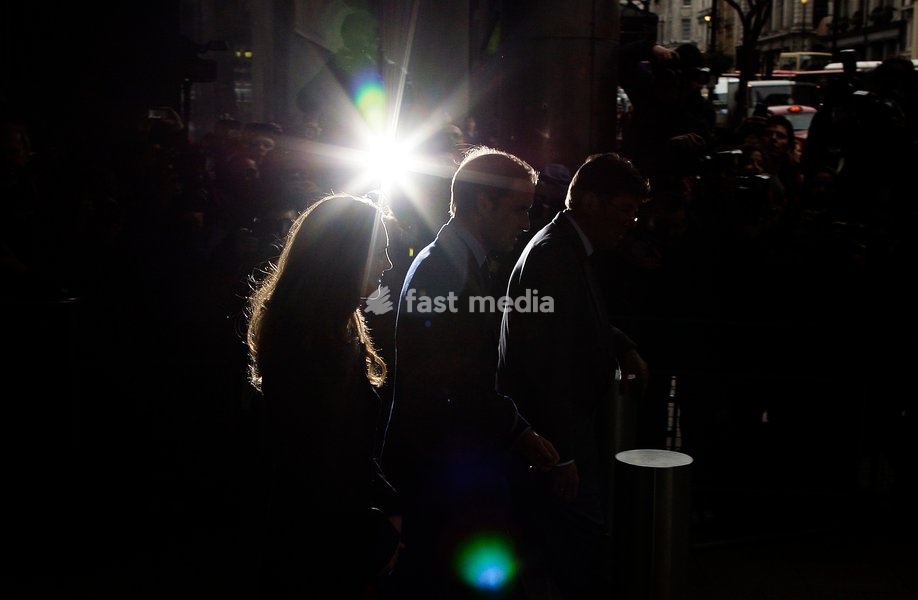 Kate Middleton and Prince William leave New Zealand House after signing in the condolences book for the victims of the Christchurch earthquake, in London, Britain, 25 February 2011