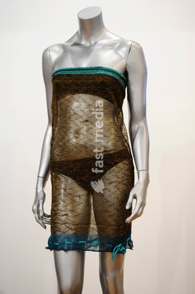 A see-through dress worn by Kate Middleton during a charity fashion show at St Andrews Universty, Scotland, in 2002, is pictured at an auction in London Great Britain on 17 March 2011. A see-through dress that helped Kate Middleton catch the eye of husband-to-be Prince William is going under the…