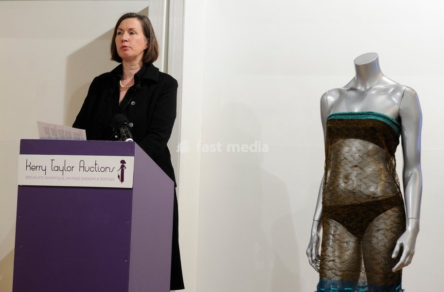 A see-through dress worn by Kate Middleton during a charity fashion show at St Andrews Universty, Scotland, in 2002, is pictured at an auction in London Great Britain on 17 March 2011. A see-through dress that helped Kate Middleton catch the eye of husband-to-be Prince William is going under the…