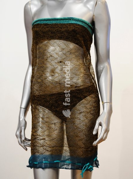 A see-through dress worn by Kate Middleton during a charity fashion show at St Andrews Universty, Scotland, in 2002, is pictured at an auction in London Great Britain on 17 March 2011. A see-through dress that helped Kate Middleton catch the eye of husband-to-be Prince William is going under the…
