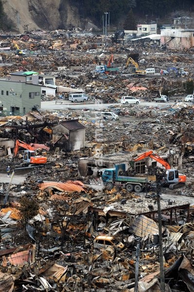 IWATE(JAPAN), March 22, 2011 () -- Excavators work on debris in quake-devastated Iwate Prefecture, Japan, on March 22, 2011