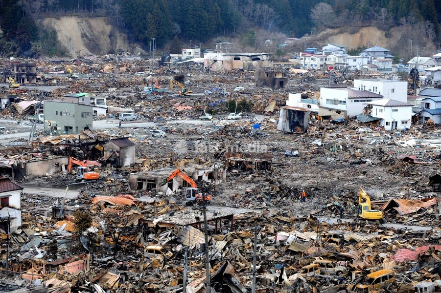 IWATE(JAPAN), March 22, 2011 () -- Excavators work on debris in quake-devastated Iwate Prefecture, Japan, on March 22, 2011