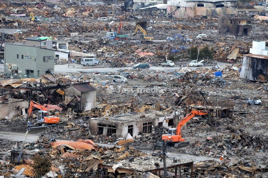 IWATE(JAPAN), March 22, 2011 () -- Excavators work on debris in quake-devastated Iwate Prefecture, Japan, on March 22, 2011