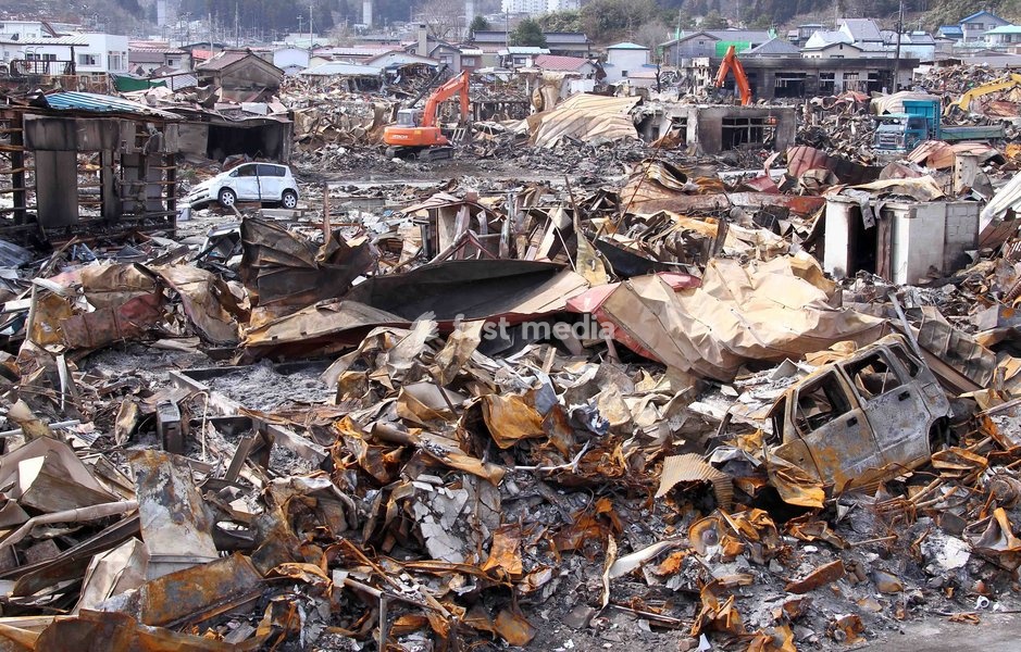 IWATE(JAPAN), March 22, 2011 () -- Excavators work on debris in quake-devastated Iwate Prefecture, Japan, on March 22, 2011